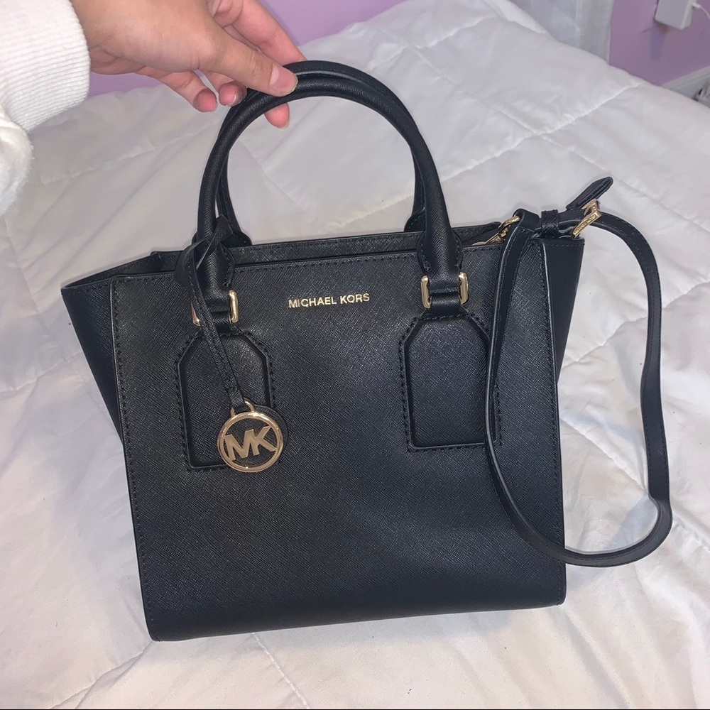 Black Micheal kors bag with gold accents